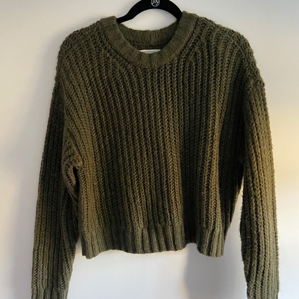 green sweater